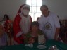 D. Oreni recebendo o presente de Natal.
